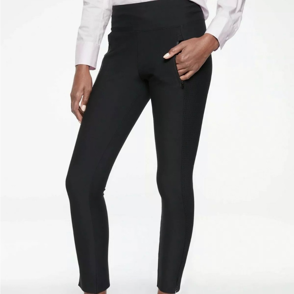 Athleta Stellar leggings size XS black perforated side panels EUC